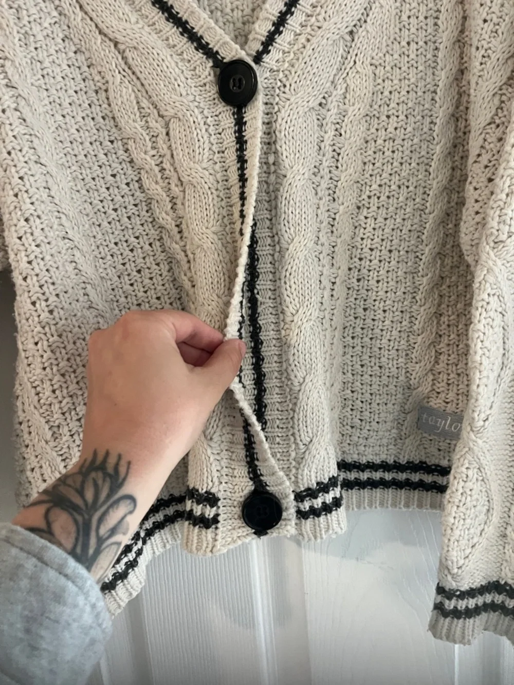 Taylor Swift Cream Cable-Knit Cardigan with Black Stripe‎ Trim- missing button